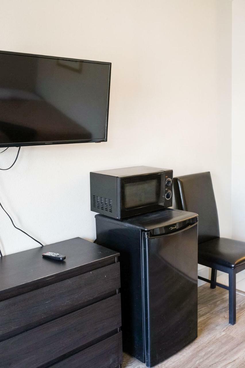 Merit Inn And Suites Μπόμοντ Δωμάτιο φωτογραφία
